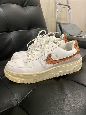 Nike Low-Top Sneakers with White & Orange Leopard Swoosh